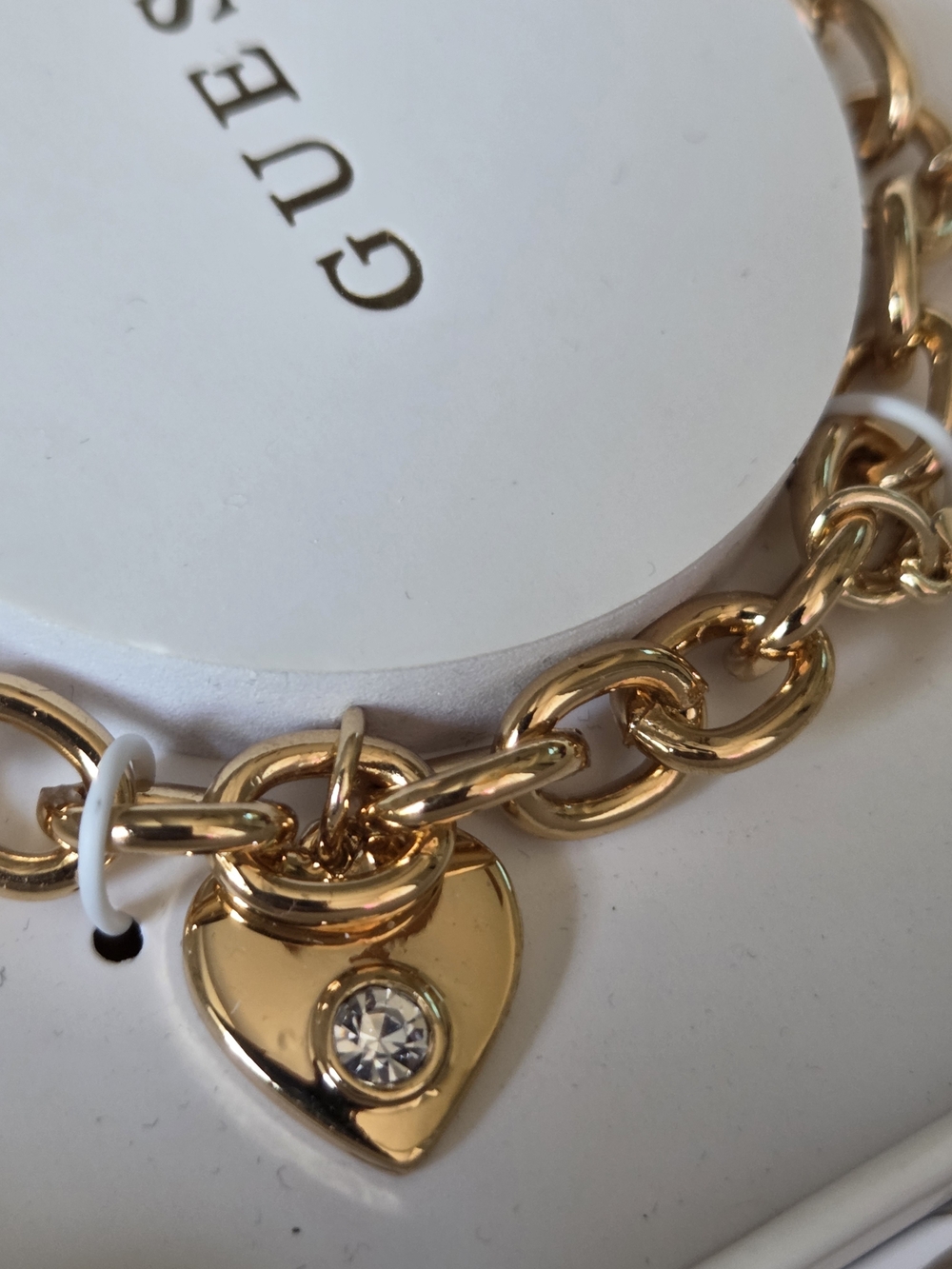 GUESS Gold-Tone Pink Charm Bracelet - Picture 6 of 7